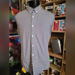 UG shirt, purple, white and brown checkered.